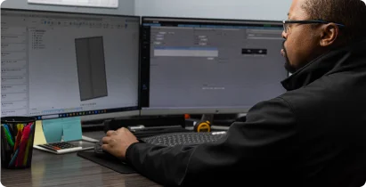 Designer working on a custom part in CAD